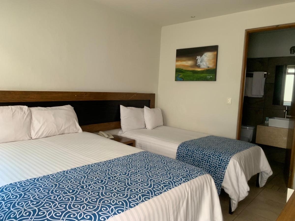 Rymma Hotel Морелия Экстерьер фото